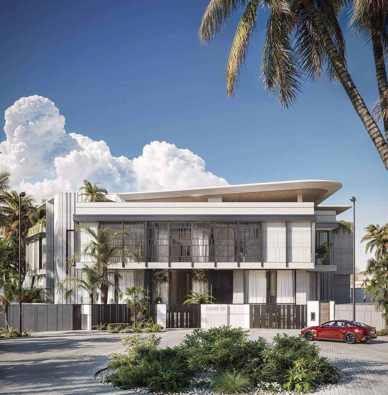 A light-colored building facade surrounded by palm trees